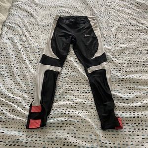 Nike running speed leggings in black with cutouts